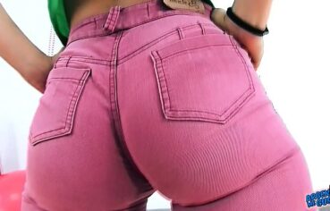 Rubbing her jeans